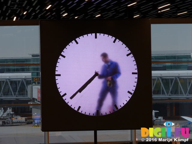 FZ030602 Painted clock at Schiphol airport